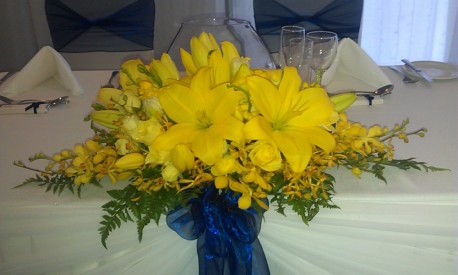 Lilies Roses and spider Orchids Long and Low Arrangement(1470204996)