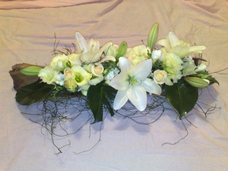 Rustic Long and Low Arrangement lilies, lisianthus, roses (1470206055)